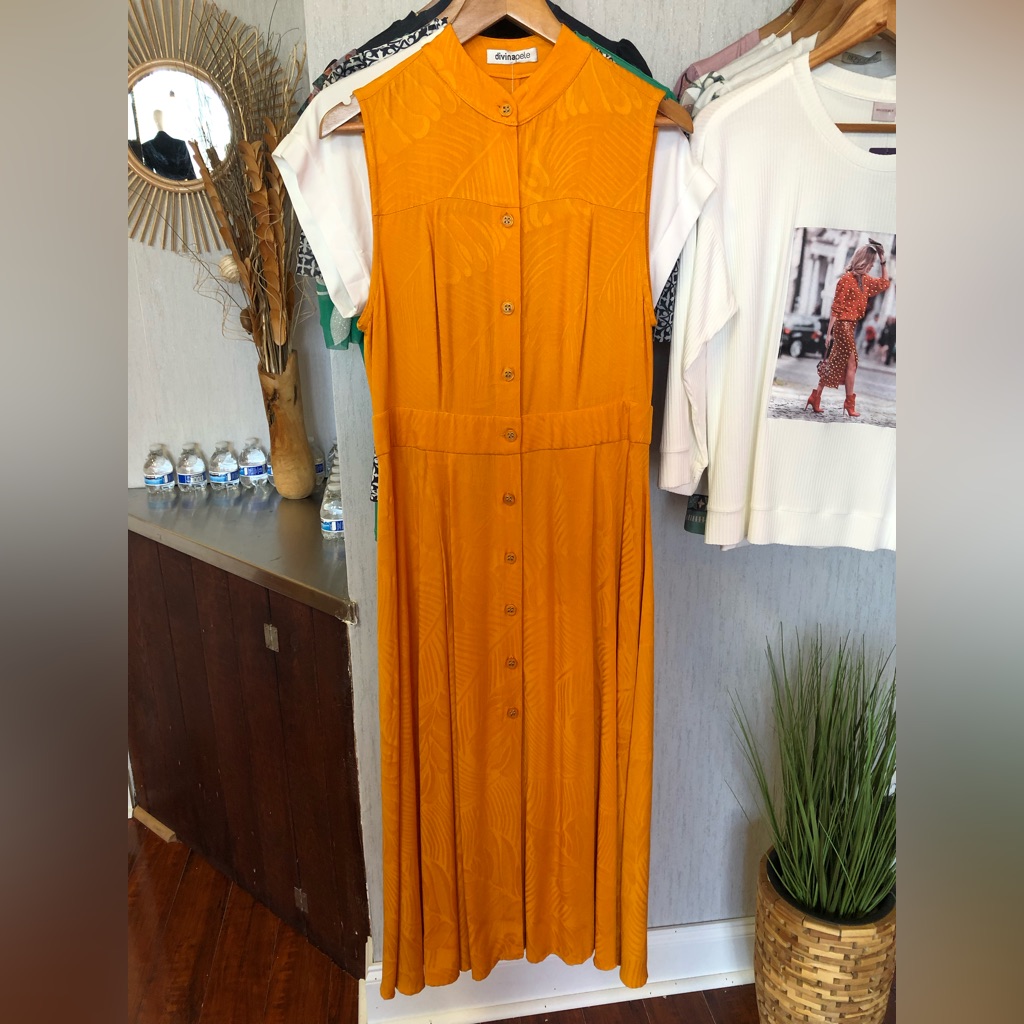 Orange Jumpsuit With Buttons.